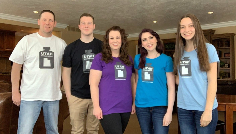 Mindie Hooley and her family stand together in their Utah insulin4all t-shirts